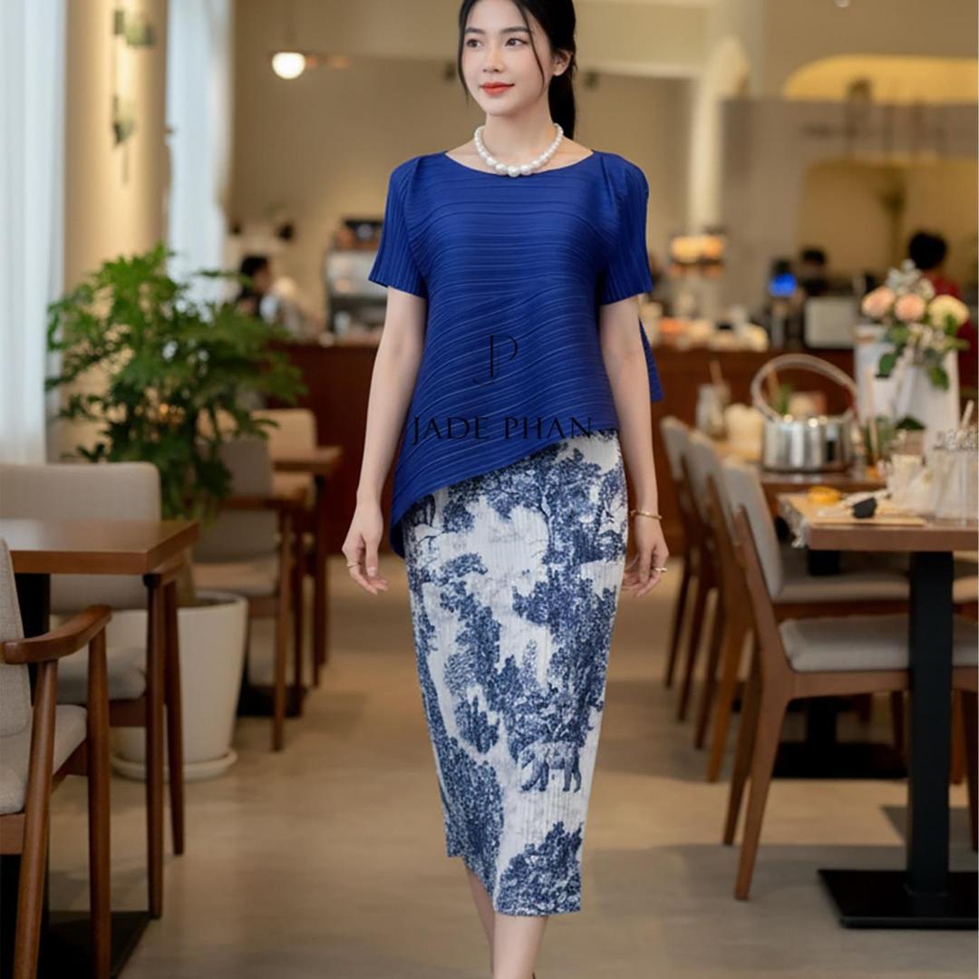 Set gồm áo và chân váyxếp ly áo katle và chân váy Holly họa tiết phong cảnh dập ly — ảnh 6