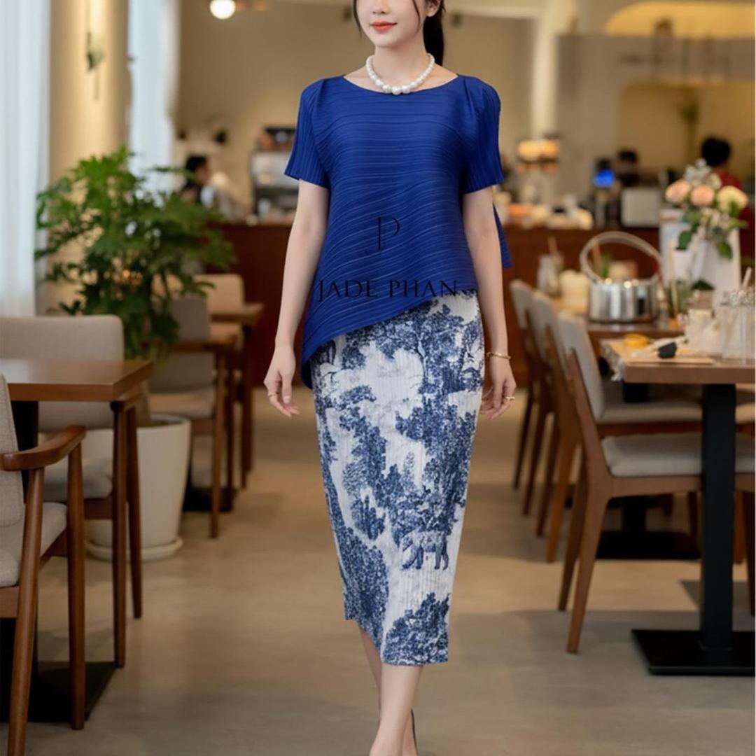 Set gồm áo và chân váyxếp ly Áo katle vàng và chân váy Holly mảng màu cam vàng xanh dập ly [+] — ảnh 9